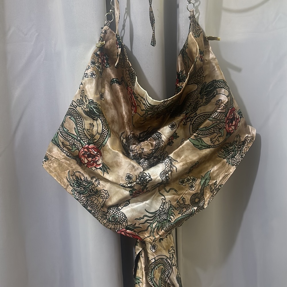 Silk WORN ONCE top tied up on the back and around the nick.
